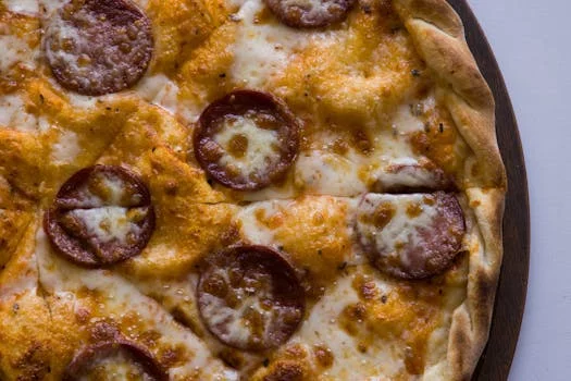 pepperoni pizza melted cheese traditional